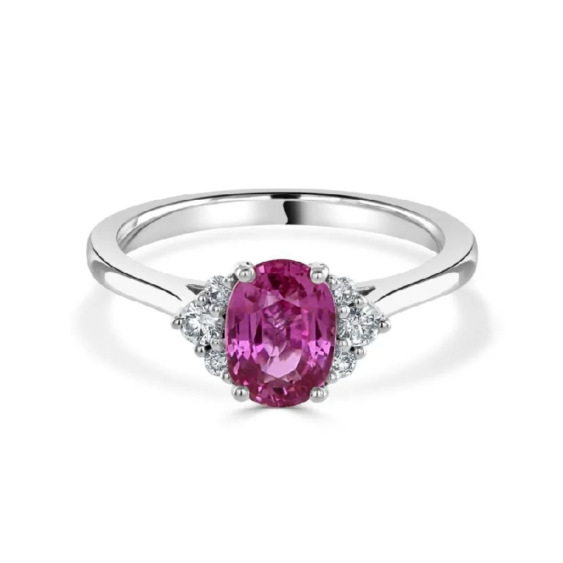 Ladies wild spirit rings -18ct white gold oval pink sapphire and diamond trefoil sides ring all claw set