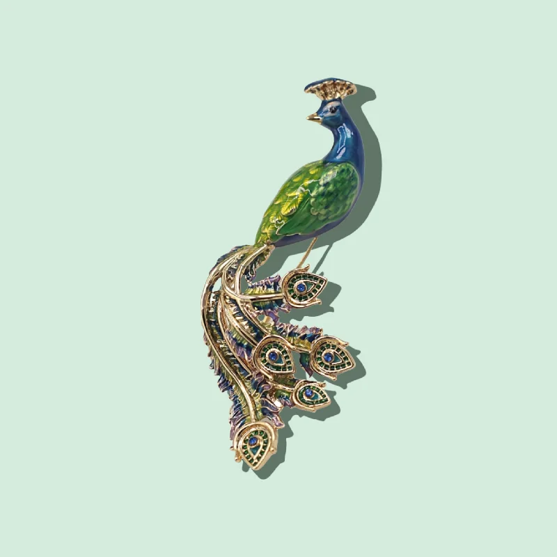 ladies gold brooch bee motifs -Peacock brooch by Bill Skinner