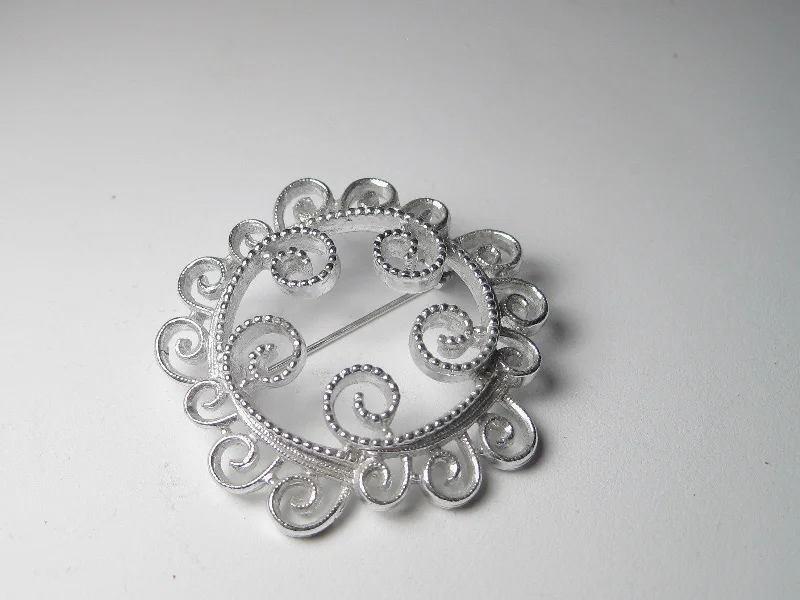 ladies brooch sunburst designs -Vintage Silver Tone Spiral Scrolled Circle Brooch, Sarah Coventry, 1970's