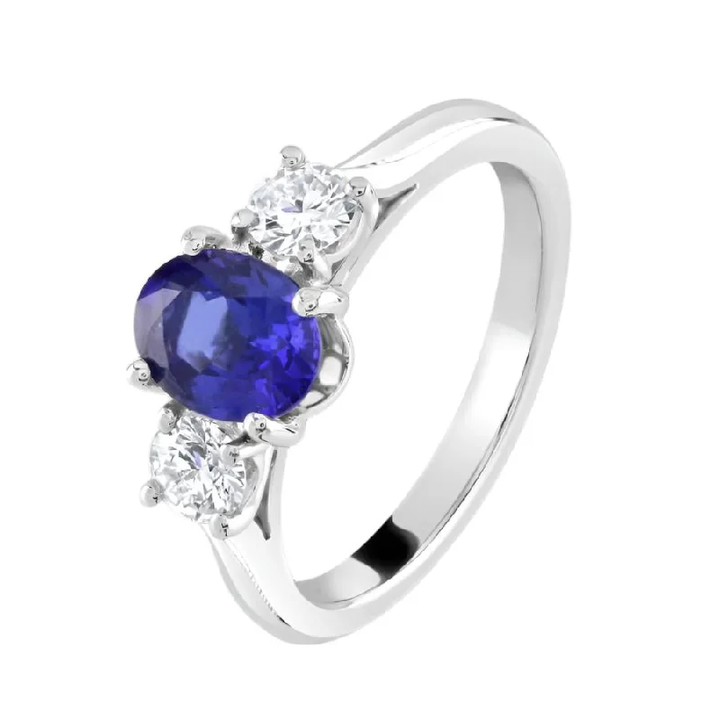 Ladies surf charm rings -Platinum Oval Cut Sapphire & Round Brilliant Cut Diamond Trilogy Ring