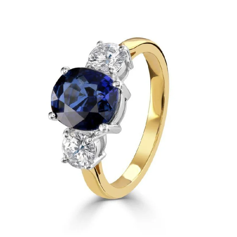 Ladies jungle flair rings -18ct Yellow Gold Oval Cut Sapphire & Round Brilliant Cut Diamond Trilogy Ring