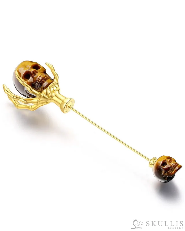 ladies gem brooch celestial themes -Gem Skull Brooch of Gold Tiger's Eye Carved Skull with Skeleton Hand in 18K Gold-Plated 925 Sterling Silver