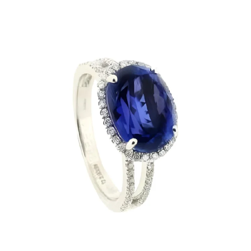 Ladies stellar edge rings -18ct White Gold Oval Cut Tanzanite & Diamond Halo Cluster Ring with Split Diamond Shoulders