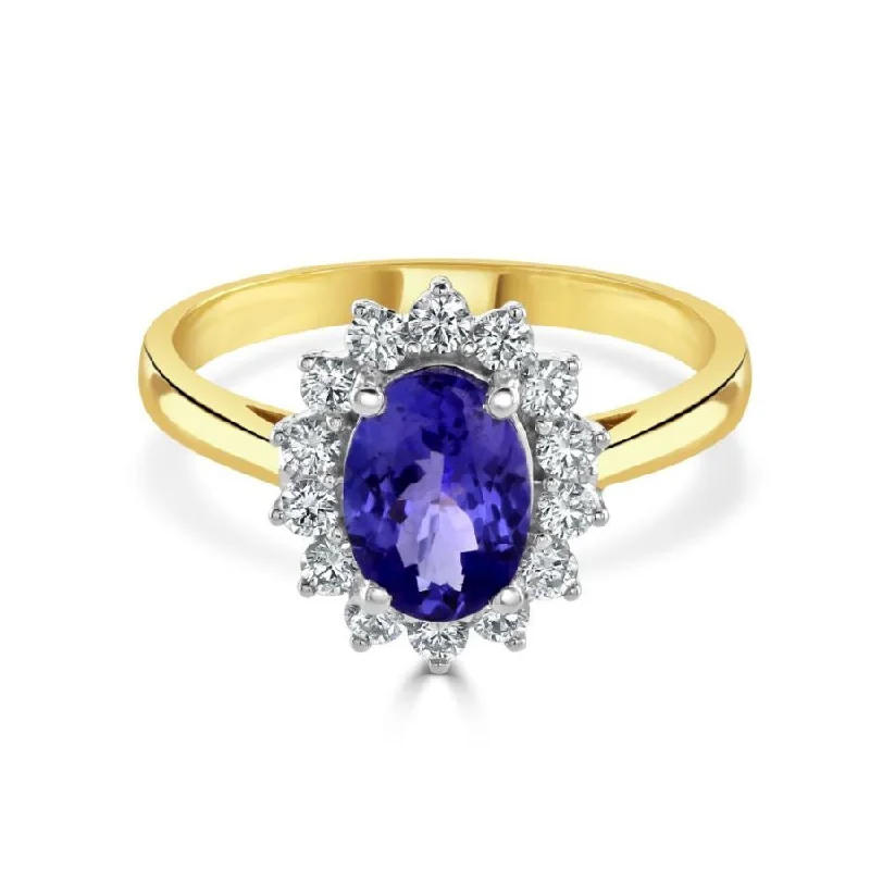 Ladies bright white gold rings -18ct white gold oval tanzanite and diamond claw set ring