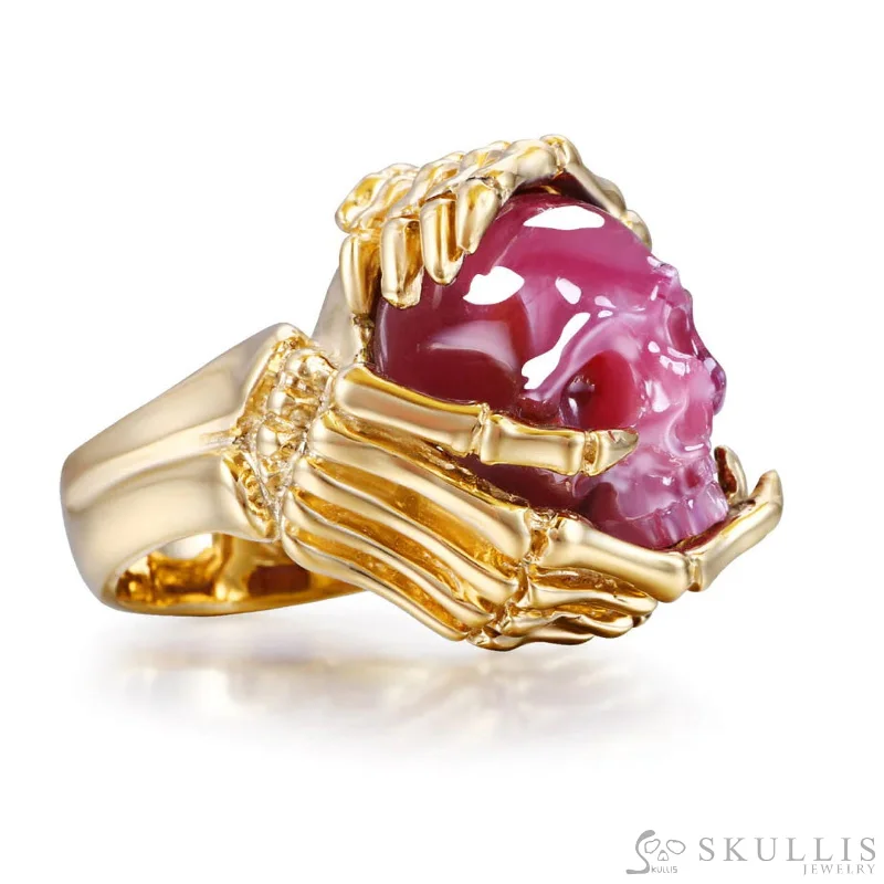 Ladies glamorous luxury rings -Gem Skull Ring of Ruby Carved Skull with Skeletal Hands in 18k Gold