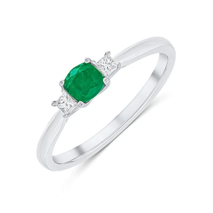 Ladies nebula flair rings -18ct white gold cushion cut Emerald and princess cut Diamond claw set three stone ring