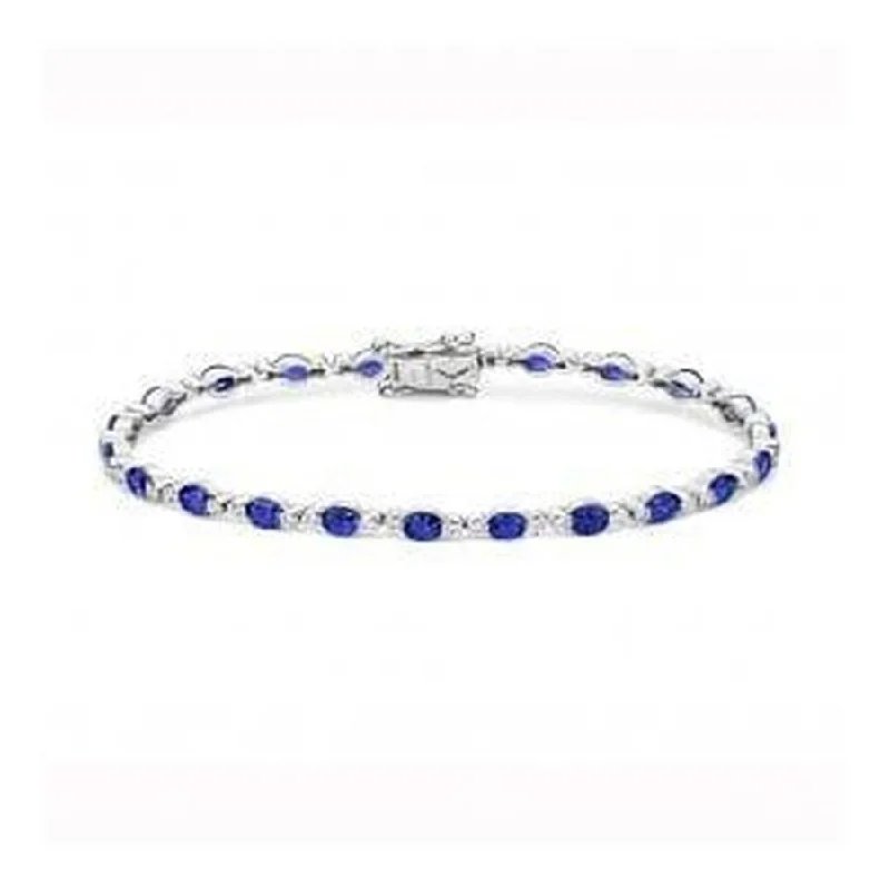 ladies gold bracelets rabbit motifs -18ct white gold stunning Tanzanite & Diamond bracelet