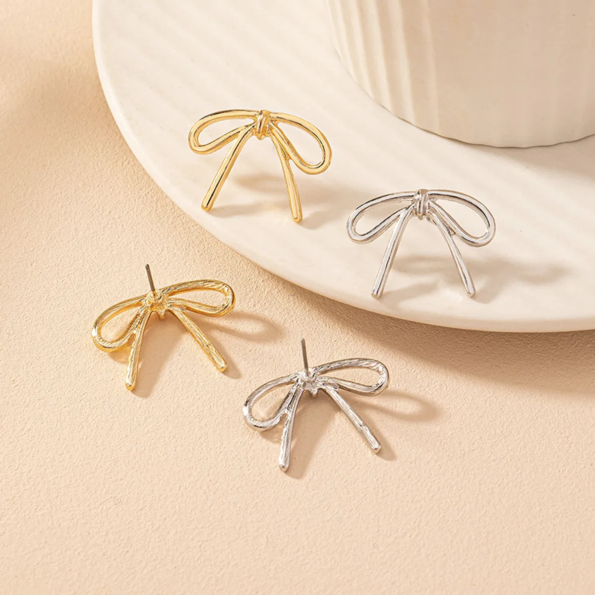 Sandy shell earrings -1 Pair Simple Style Bow Knot Alloy Zinc Ear Studs