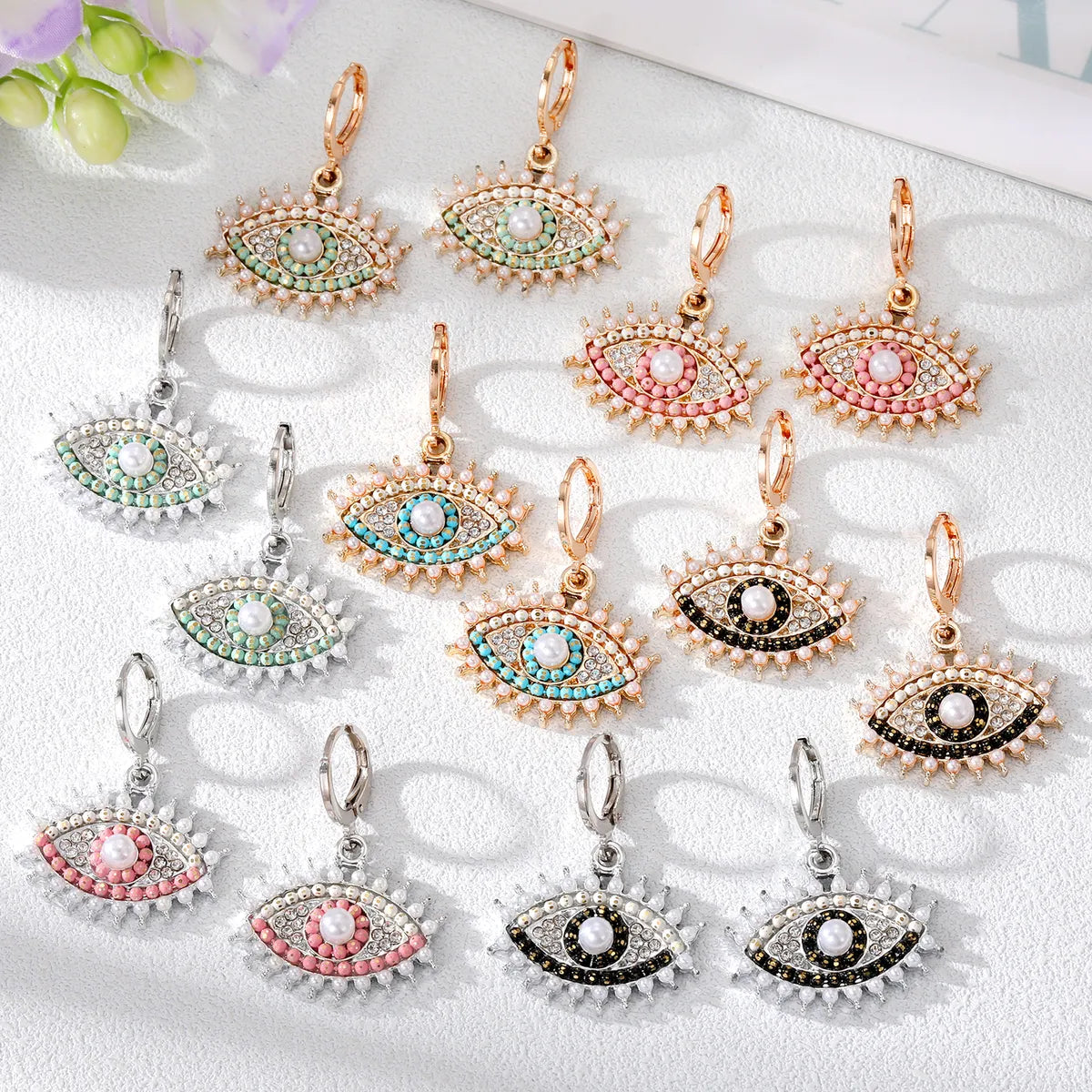 Clasp gleam earrings -Wholesale Jewelry 1 Pair Fashion Devil's Eye Alloy Pearl Ear Studs