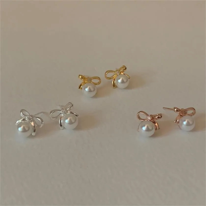 Exclusive craft earrings -1 Pair Sweet Simple Style Bow Knot Inlay Sterling Silver Pearl Zircon Ear Studs