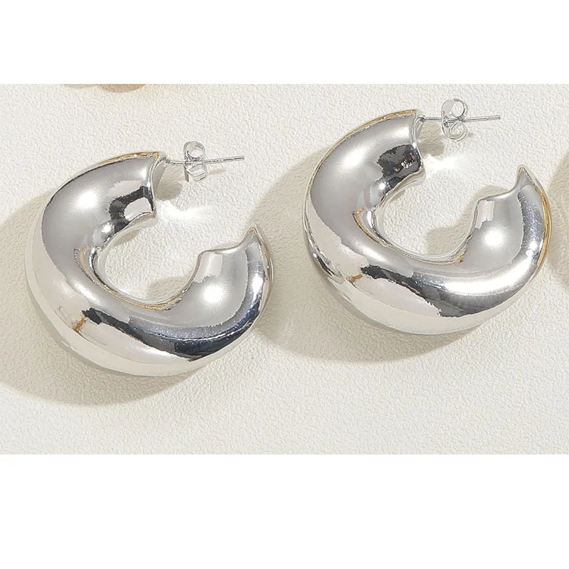 Twisted C-shaped earrings in real white gold - ES2262